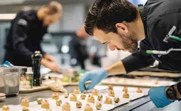 chef decorating pastries