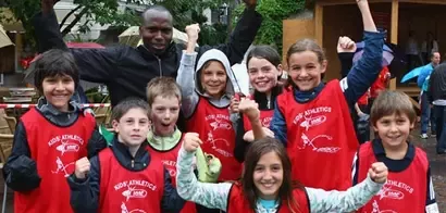 IAAF ambassador Wilson Kipketer and school children in Denmark