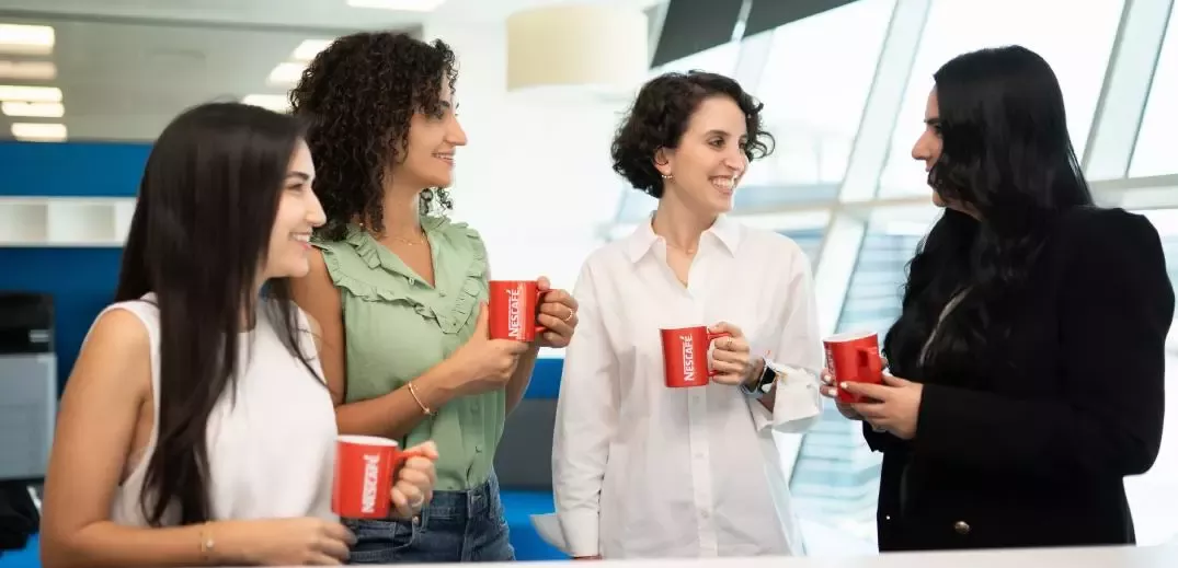 colleagues drinking Nescafé