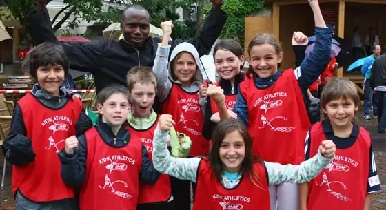 IAAF ambassador Wilson Kipketer and school children in Denmark